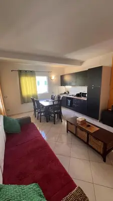 a living room with a couch and a table at Estrella Do Mar Santa Maria in Santa Maria