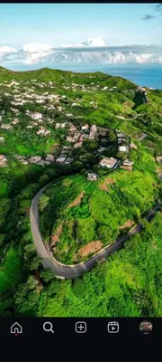 an aerial view of a road on a hill with houses at Djabraba's Boarding Rooms in Garça