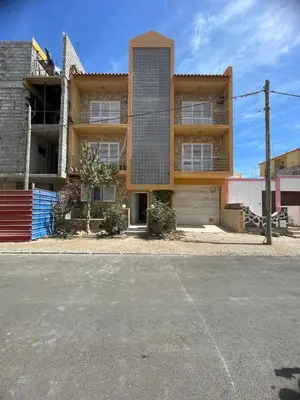 an empty parking lot in front of a building at Casa di Mar in Santa Maria
