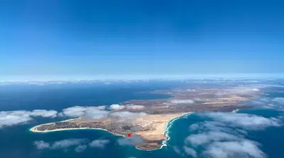 an aerial view of an island in the ocean at Joia Escondida in Santa Maria