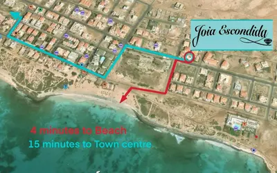 a map of a beach with the approximate location of a resort at Joia Escondida in Santa Maria