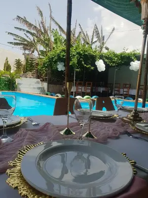 a table with a glass plate on top of a table at Quinta Refúgio in Ribeirão Chiqueiro
