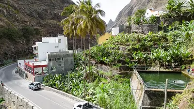 a car driving down a road on a mountain at Residencial Mãe Nona in Ribeira Grande