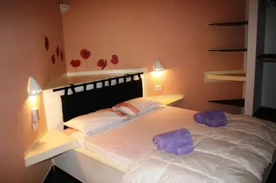 a bedroom with a bed with two pillows on it at Endless Summer B6 in Sal Rei