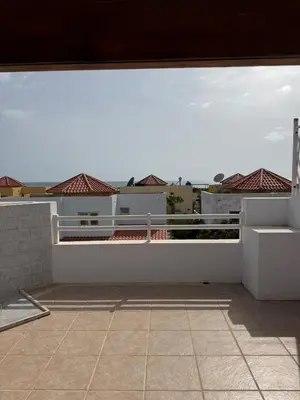 a view from the balcony of a house at Murdeira V152 Duplex by RPG Group in Beirona