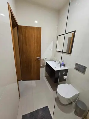 a bathroom with a toilet and a sink at Sheila Apartment in Espargos