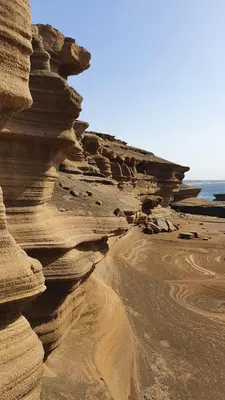 a group of rocks on a beach near the ocean at Residência Alto Saco, Ocean-view double room in Tarrafal