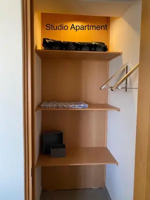 a cupboard with a sign that reads studio apartment at Crown Paradise Beach Lagoon Studio in Sal Rei