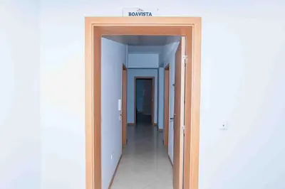 a hallway with a hallway leading into a room at Chã de Areia Lounge Vista Mar - Apartamento T2 in Praia