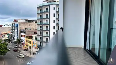 a view of a city street from a window at Serenity in Praia