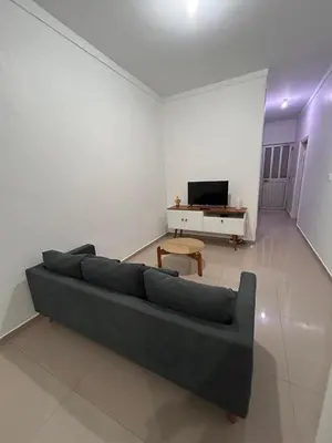 a living room with a couch and a table at Sun & Sea Tarrafal in Tarrafal