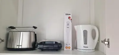 a kitchen counter with a toaster and a blender at Sal Casa VILLAGE in Santa Maria