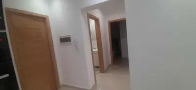 an empty room with two doors and a hallway at Lucy aparte in Praia