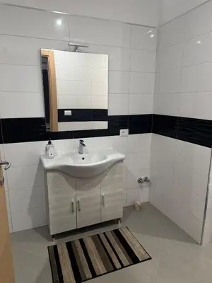 a bathroom with a sink and a mirror at Penthouse Ocean View in Mindelo