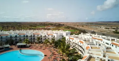 an aerial view of a resort with a swimming pool at Lux 1BR S Maria 90 Day Stay in Santa Maria