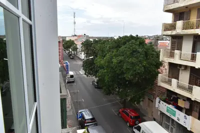 a view of a city street from a window at Casa Berta - Downtown Apartment in Praia