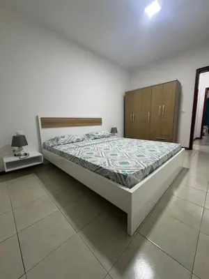 a bedroom with a bed and a dresser and a bed sidx sidx sidx sidx at Paz, Tranquilidade e Conforto in Espargos