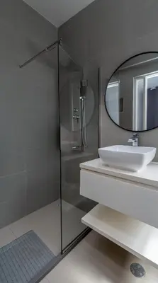 a bathroom with a sink and a mirror at Casa Miranda in Mindelo