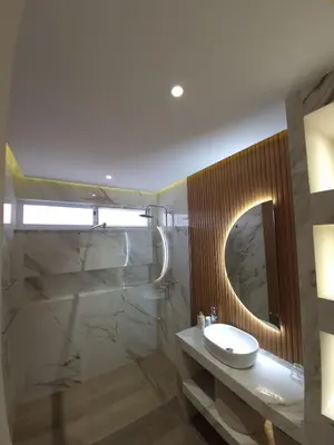 a bathroom with a sink and a mirror at Casa strella in Praia