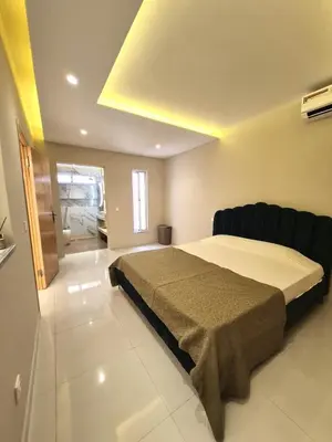a bedroom with a large bed in a room at Casa strella in Praia