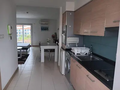 a kitchen with a sink and a counter top at Vila Verde House in Santa Maria