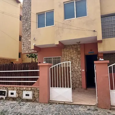 a house with a gate and a door at Ca' Estrella Santa Maria Sal in Santa Maria