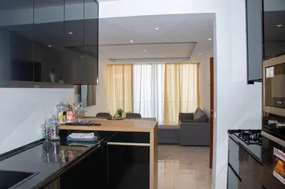 a kitchen with a counter top in a room at Fresh One Apartment in Praia