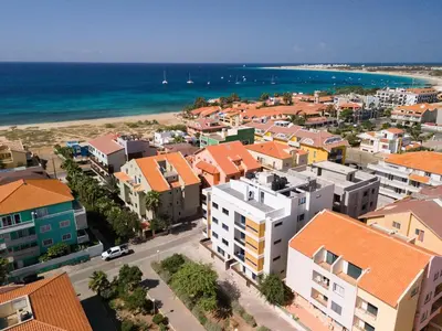 an aerial view of a city and the ocean at New building - 1 min away from the main road in Santa Maria