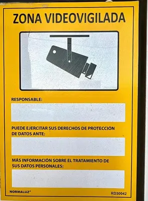 a yellow sign that reads zona videoodvisoradobeadobefficientfficient at Salinas Breeze in Santa Maria