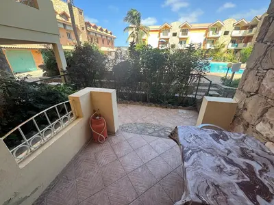 a balcony of a building with a pool at Holiday Properties Djadsal Pirata - Wi-fi in Santa Maria