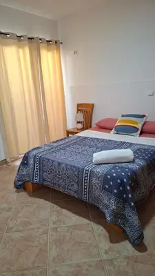 a bedroom with a bed with two towels on it at Star House Murdeira, Sal Island, Cape Verde in Beirona