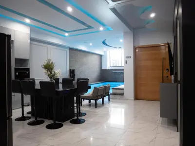 a dining room with a table and chairs at Top-Level Pool in Praia