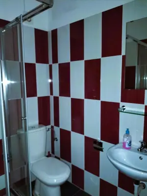 a bathroom with a toilet and a sink at Hotel Miranda & Miranda in Ponta do Sol