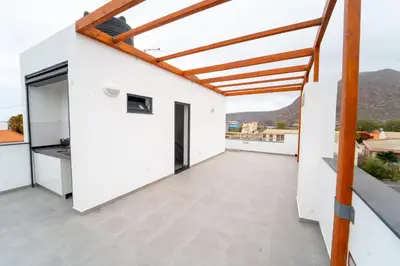a balcony with white walls and a wooden roof at GREEN STUDIO TARRAFAL - Ap 02 in Prainha