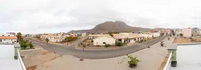 a view of a bridge in a town with a mountain at GREEN STUDIO TARRAFAL - Ap 02 in Prainha