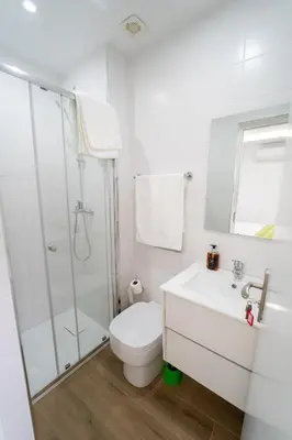 a bathroom with a toilet and a shower and a sink at GREEN STUDIO TARRAFAL - Ap 01 in Prainha