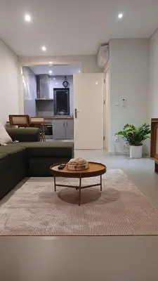 a living room with a couch and a coffee table at Clara's Place - Morabeza Suite in Praia