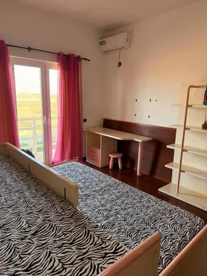 a room with a bed and a desk with a zebra rug at Murdeira Villa with Private Pool V164 by RPG Group in Beirona
