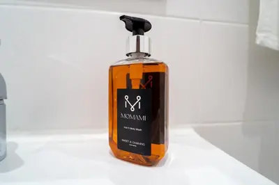 a bottle of alcohol sitting on a counter at GREEN STUDIO TARRAFAL - Ap 04 in Tarrafal