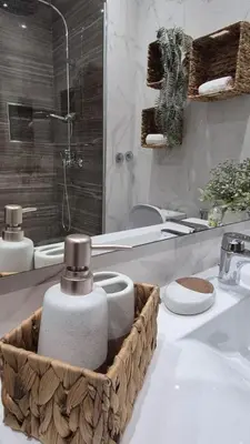 a bathroom with a sink and a toilet and a mirror at kriola Breeze in Praia