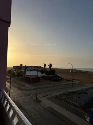 a view from a balcony of a house with the ocean at Seaside apartment in Shell Beach in Santa Maria