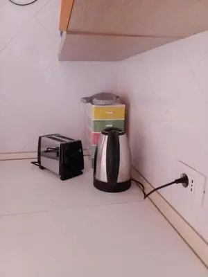 a toaster sitting on a counter in a kitchen at Holiday Properties Vista Do Mar - Wi-fi in Santa Maria