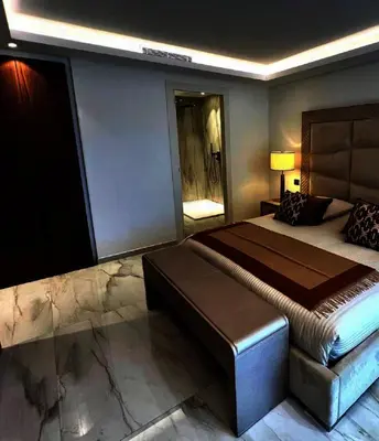 a large bedroom with a large bed and a window at Sunshine Gold Spot in Santa Maria