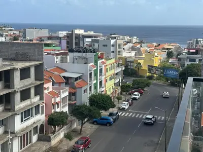 a view of a city with cars driving down a street at Bestview of Palmarejo in Praia