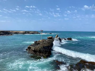 a rock in the ocean with waves crashing on it at Penthouse Lieblingsplatz - Favorite place frontline in Sal Rei