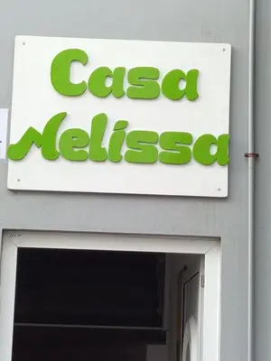 a sign for a casa malanca sign on a building at Casa Melissa in Ponta do Sol