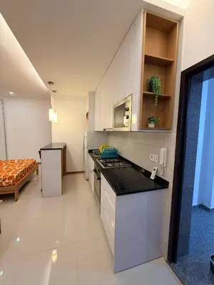 a kitchen with a counter top in a room at FreLux Urban Studio in Praia