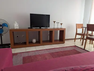 a living room with a television on a table at Apartamento Espargos in Espargos