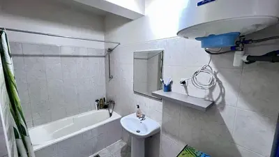 a bathroom with a sink and a bath tub and a sink at Sossego e mar, Lazareto in Lazareto