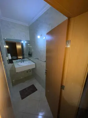 a bathroom with a sink and a mirror at Pousada do Norte, ilha do Fogo in Calheta de São Miguel